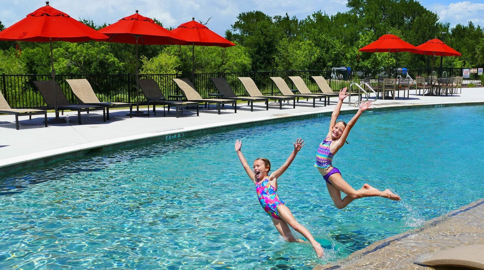 Outdoor pool and discovery center at Whisper Valley